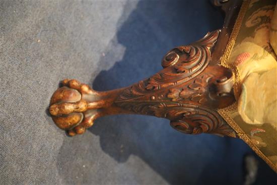 An early 18th century style mahogany wing armchair, W.2ft 8in. D.2ft 8in. H.4ft 9in.